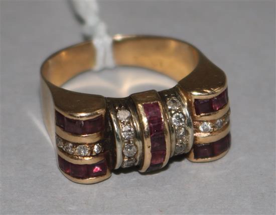 A 1940s gold, ruby and diamond set cocktail ring, size P.